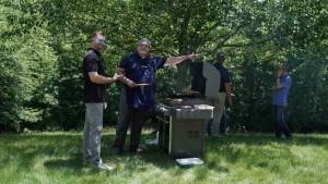 mowery employees working grill at company picnic