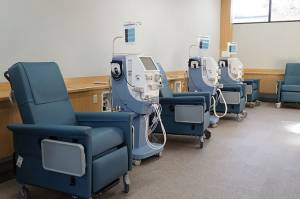 dialysis machines and chairs along wall